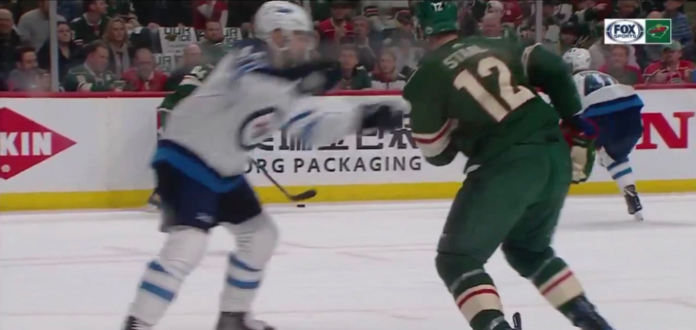 Eric Staal takes brutal cross-check to neck from Jets' Morrissey